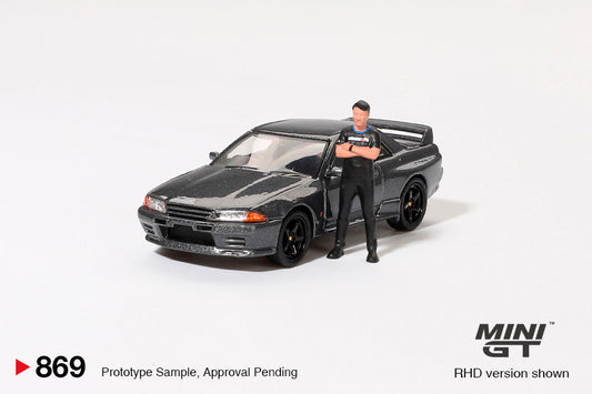 Mini GT 869 Nissan Skyline GT-R (R32) Gunmetal W/ Matsuda Figure